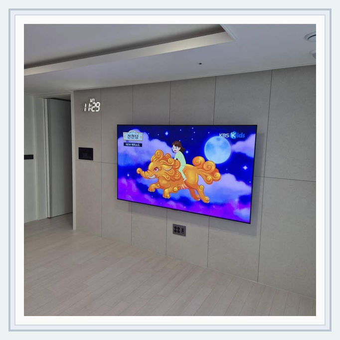 벽걸이TV 실제 시공 사진 2 · 영종구 TV·셋톱박스 배선 집약 점검과 벽면 미관과 브라켓 위치